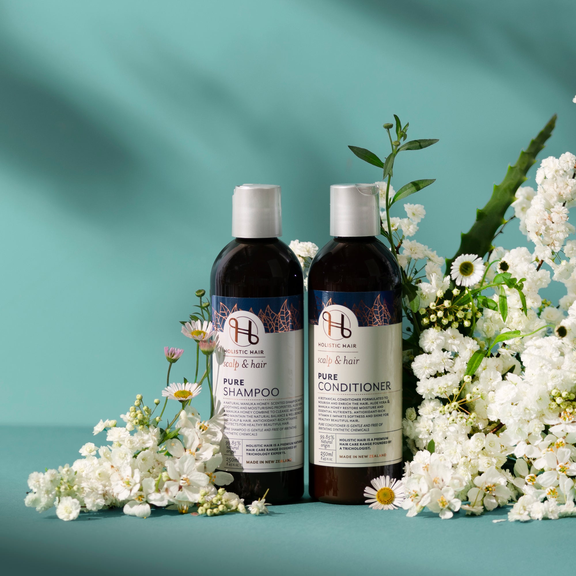 Natural haircare duo with aloe vera, vitamin E, and manuka honey, ideal for sensitive scalps and gentle cleansing.